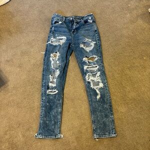 Size 0 super ripped, high rise, American Eagle stretch loose jeans.